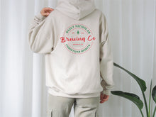 Load image into Gallery viewer, Saint Nicholas Brewing Co Hoodie Sweatshirt
